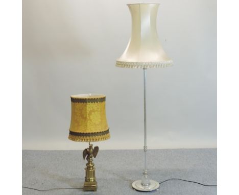 A brass table lamp, in the form of an eagle, with shade, 89cm tall overall, together with a standard lamp 