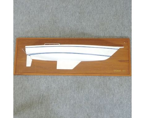 A model of a ship's hull, mounted on a wooden board, 107 x 36cm