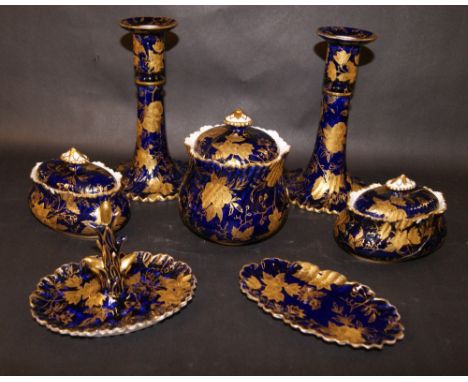 A Hammersley ceramic part dressing set, detailed with gilt-over-cobalt blue glaze