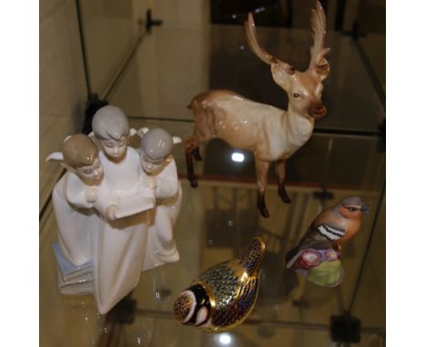 Collectable ceramics, to include a Nao figure group, Crown Derby bird, Beswick stag (A/F) and a Royal Worcester bird