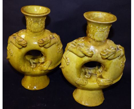 Pair of unusual Oriental ceramic altar vases with applied dragons