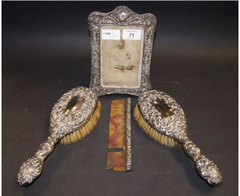 Hallmarked silver-backed brushes, comb and similar picture frame