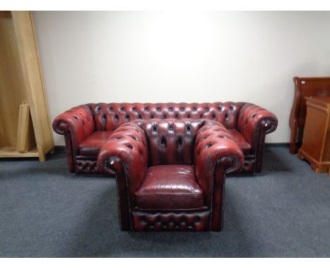 A red button leather Chesterfield club settee and armchair 