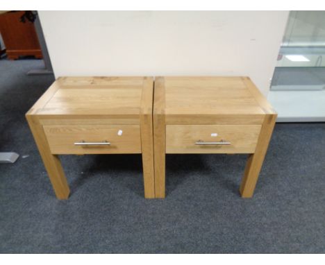 A pair of contemporary oak lamp tables fitted a drawer  