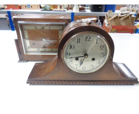 An Art Deco oak eight day mantel clock together with a further dome top mantel clock 