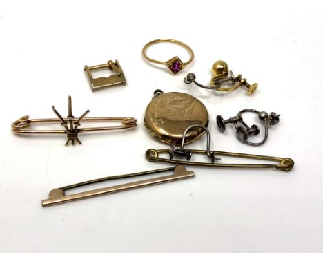 A 9ct gold bar brooch, 1.8 grams, together with two further bar brooches, a yellow metal ring, a yellow metal buckle, five ea