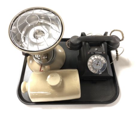 A tray containing vintage Bakelite GPO telephone handset together with a stoneware hot water bottle and a Barber Health Maste