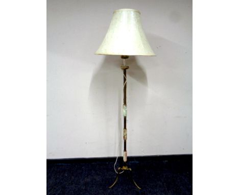 A brass and onyx standard lamp with shade 