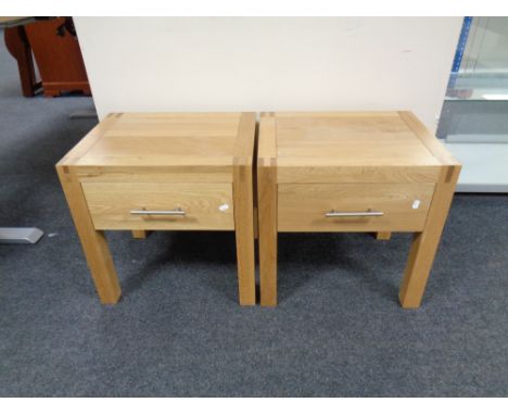 A pair of contemporary oak lamp tables fitted a drawer  