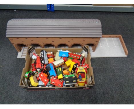 A box containing a quantity of Golden Bear plastic, Thomas the Tank Engine engines, together with a hand built wooden train s