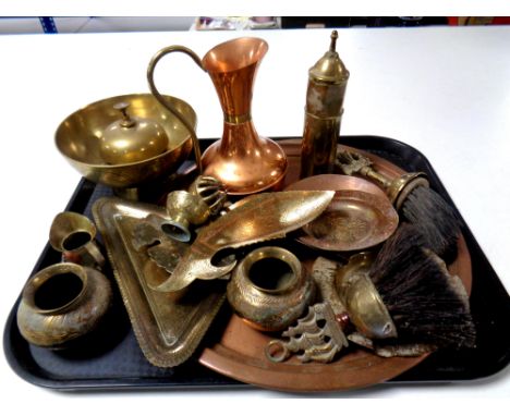 A tray of copper and brass ware including circular tray, eastern dishes and vases, copper jug, brass table lighter etc 