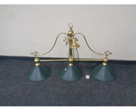 A brass three way snooker table light with glass shades 