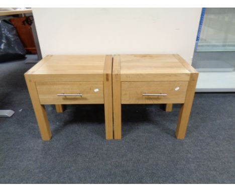A pair of contemporary oak lamp tables fitted a drawer  