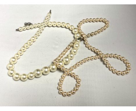 Two faux pearl necklaces 