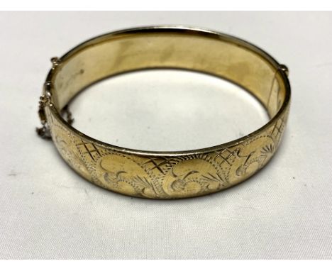 A vintage silver engraved bangle 