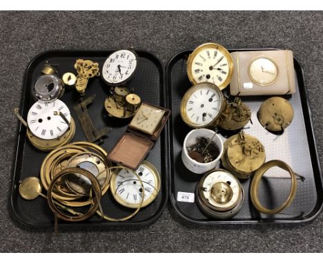 A tray containing a quantity of clock parts and components, mantel clock, Ingersol travel clock etc 