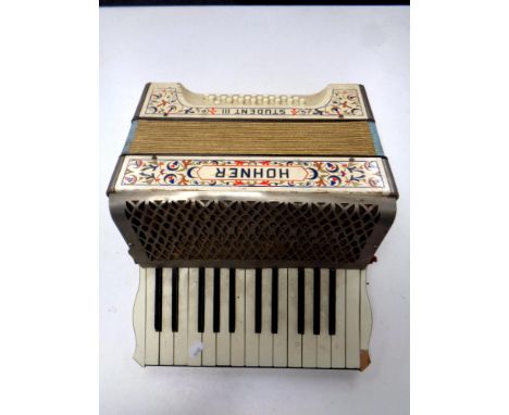 A Hohner Student III accordion 