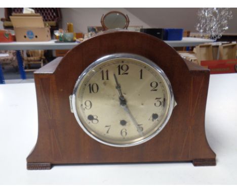 A 1930s Art Deco mantel clock with silvered dial  