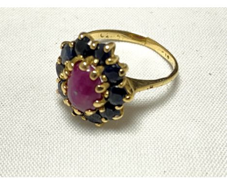 A 9ct gold garnet and ruby ring  