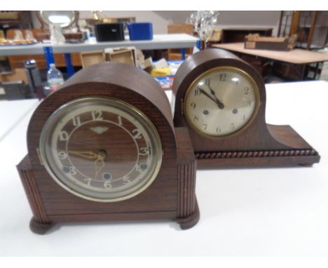 An Art Deco oak cased Westminster chime mantel clock together with a further mantel clock with silvered dial 
