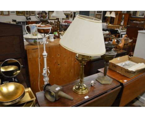 Ana antique brass carriage lamp; a table and an oil lamp base 