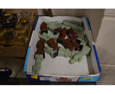 A box of Chinese resin chess pieces