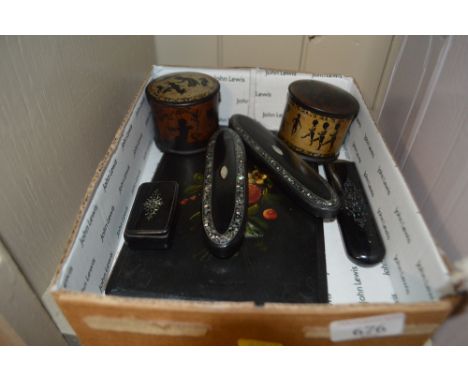 A tray containing Victorian papier maché items to include a snuff box, spectacle cases etc. 