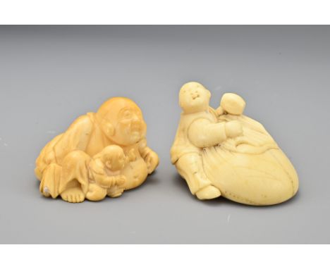 A Japanese ivory netsuke of figure holding a mallet with bag, possibly Daikoku. Together with an ivory netsuke of Buddha and 