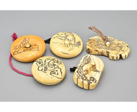 A group of five ivory Manju netsuke. To include a two-piece Manju netsuke of bathing scene, signed. Manju netsuke depicting a