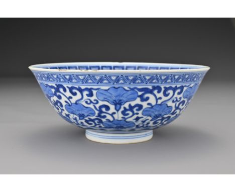 A Chinese 18/19th Century blue and white porcelain bowl. The bowl finely decorated in underglaze blue with a ruyi lappet patt