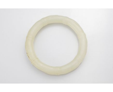 Chinese pale celadon jade bangle in bamboo form. Diam. 8cm. Inner diam. 6cm 