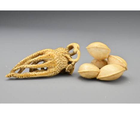 A Japanese ivory netsuke in the form of a finger citron/Buddha's hand, Meiji period. Together with ivory 'Gingko nuts' netsuk