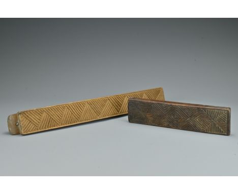 Two Chinese carved wooden print blocks. One with Chinese characters carved verso. Largest length 43.5cm.Purchased in Hong Kon