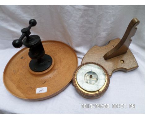 Wooden and iron press, wooden wall bracket and a small aneroid barometer