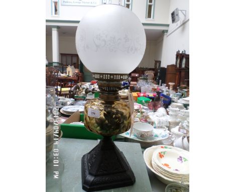 Light yellow coloured glass oil lamp with decorative domed clouded glass etched shade