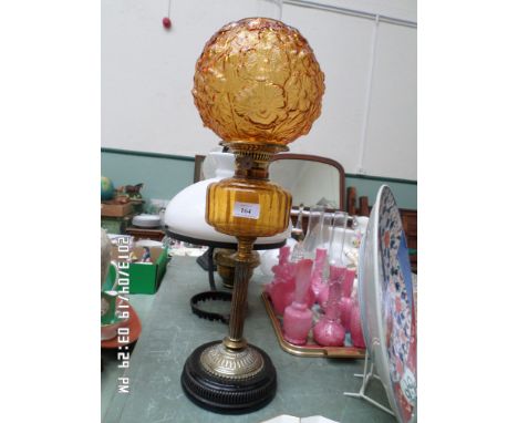 Fine amber glass oil lamp with matching bowl, corinthian columns brass support on circular black pot base