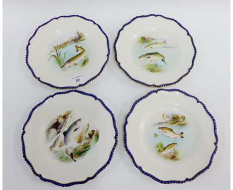 Set of four Royal Worcester plates, each with hand painted freshwater fish pattern with cobalt  blue and gilt edged rims, wit