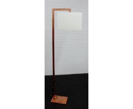 Contemporary rose gold coloured metal standard lamp and shade, 170cm