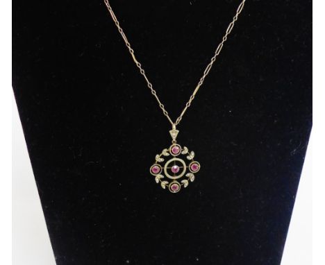 Early 20th century 9 carat gold garnet and seed pearl pendant on chain 