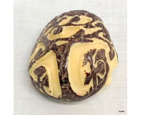 A carved Tagua nut Netsuke