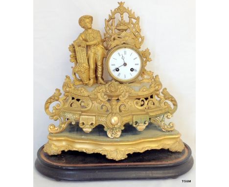 A 19th century gilt metal figural clock fitted 2 train French movement striking on a bell with pendulum and 2 wood bases 42cm