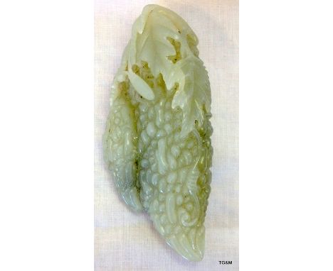 A Chinese pale and Celadon Jade carving of Bitter Melon 12.7cm long