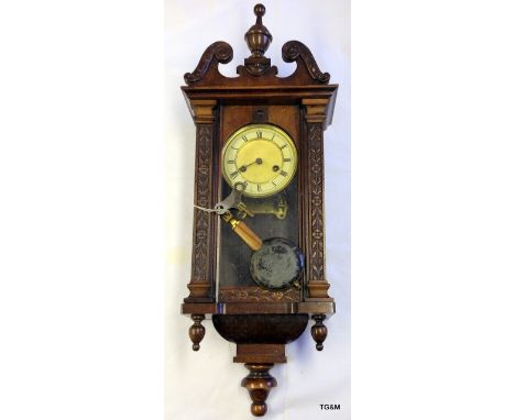 Mahogany chiming wall clock with glazed door and swan neck pediment 69cm high