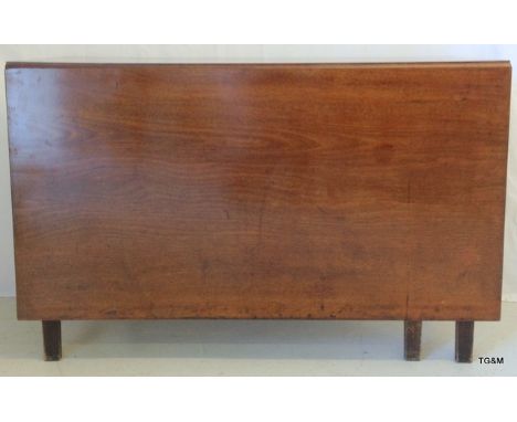 A mahogany drop leaf gate leg table 74 x 117 x 56