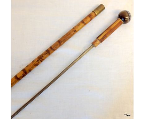 A bamboo shafted sword stick with agate stone ball handle