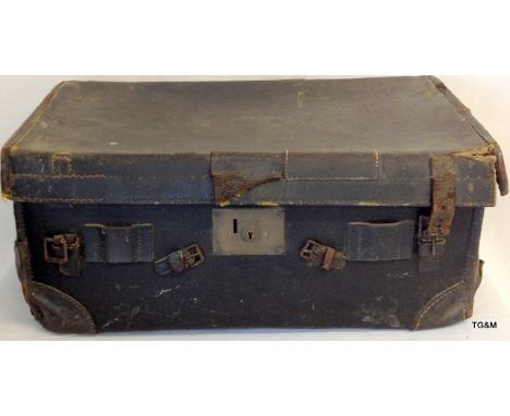 A leather travel trunk