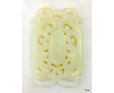 A pierced Chinese White Jade pendant length 5.4cm