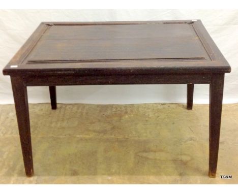 An oak panel coffee table 46h x 76w x 57d