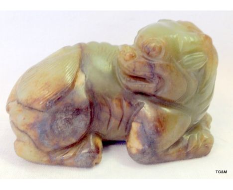 A Chinese yellow and russet Jade carving of a mythical beast length 7.2cm