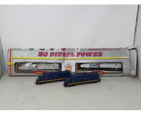 A part boxed A.H.M. HO scale diesel Locomotive with dummy unit and two unboxed American diesel Locomotives in 'B&amp;O' liver